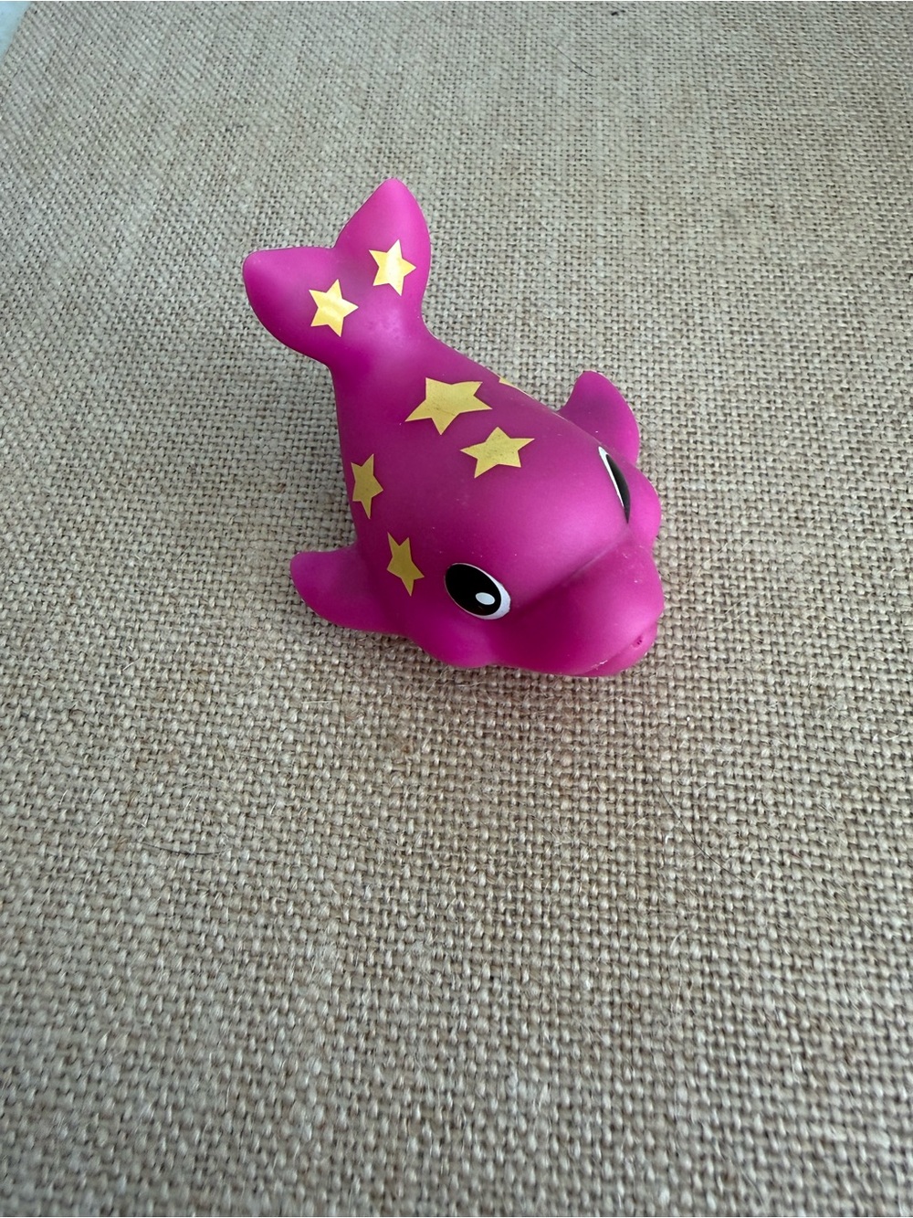 Munchkin Magenta Dolphin Bath Toy with Yellow Stars